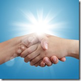 handshake on blue sky and sunlight